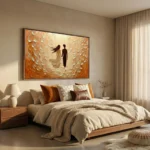Textured figurative hand-painted canvas depicting two silhouettes among layered cream and terracotta brushstrokes, modern bedroom setting