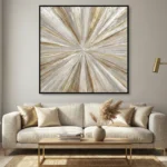 Textured abstract hand-painted canvas with radiating brushstrokes in cream, gold and taupe tones, contemporary living space