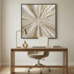 Abstract radial hand-painted canvas with layered cream, gold, and taupe brushstrokes converging at center, contemporary office space