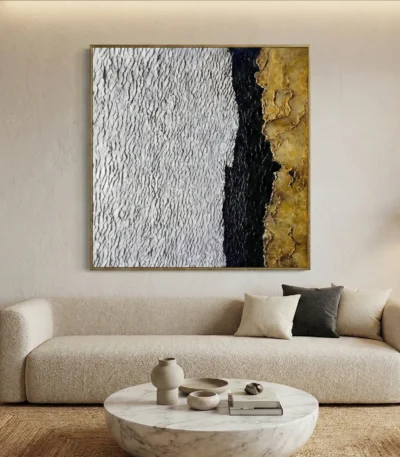 Textured abstract hand-painted canvas with white, black, and gold leaf vertical color blocking, contemporary living space