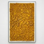 Textured abstract hand-painted canvas with layered golden straw bundles in warm ochre tones, contemporary wall space