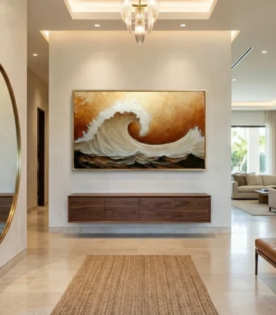 Textured contemporary hand-painted canvas depicting a dynamic ocean wave in cream and burnt sienna tones, modern entryway
