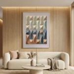 Geometric abstract hand-painted canvas in layered earth tones and soft blues, contemporary living space