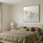 Textured minimalist hand-painted canvas depicting snow-capped mountain peaks in soft white and grey tones, modern bedroom