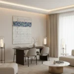 Abstract hand-painted canvas with blue geometric blocks and scattered marks on cream, contemporary interior