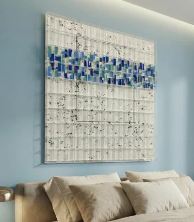 Textured abstract hand-painted canvas with blue and teal gestural marks on cream speckled ground, contemporary bedroom
