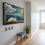 Gestural expressionist hand-painted canvas depicting an open book against stormy seas and golden sky in blue and ochre tones, modern hallway