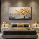 Textured hand-painted canvas depicting golden tree with layered foliage in ochre and cream tones, contemporary bedroom setting