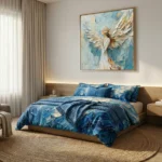 Textured hand-painted canvas depicting an ethereal winged figure in cream and gold against layered blue tones, modern bedroom