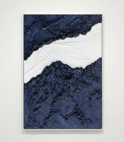 Textured abstract hand-painted canvas in deep navy and white with layered gestural brushstrokes, contemporary wall art