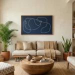 Minimalist abstract hand-painted canvas with continuous white line gestures on deep navy, contemporary living space