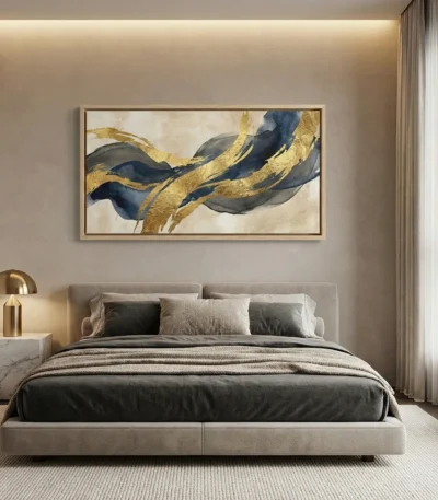 Gestural abstract hand-painted canvas with flowing navy and gold leaf brushstrokes on cream ground, modern bedroom