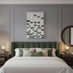 Minimalist abstract hand-painted canvas with geometric blocks in cream, white, and forest green tones, modern bedroom