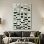 Minimalist hand-painted canvas with geometric green and cream blocks in rhythmic pattern, contemporary living space
