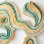 Gestural abstract hand-painted canvas with organic flowing forms in teal, golden yellow, and cream tones