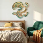 Contemporary abstract hand-painted canvas with undulating organic forms in teal, ochre, and cream tones, modern bedroom