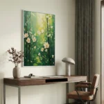 Impressionist hand-painted canvas with cascading cream and yellow flowers against layered green brushstrokes, contemporary workspace
