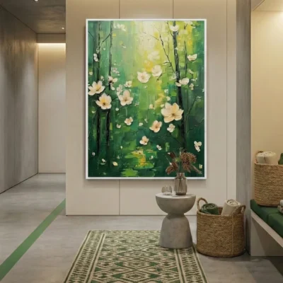 Layered abstract hand-painted canvas depicting cream flowers and dark branches against vibrant green tones, contemporary entryway
