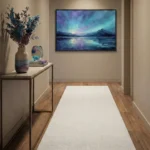 Impressionist landscape hand-painted canvas depicting a serene lake at dusk in purple, teal, and blue tones, contemporary entryway