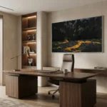 Textured abstract hand-painted canvas with dramatic black and gold gestural brushstrokes, contemporary office space