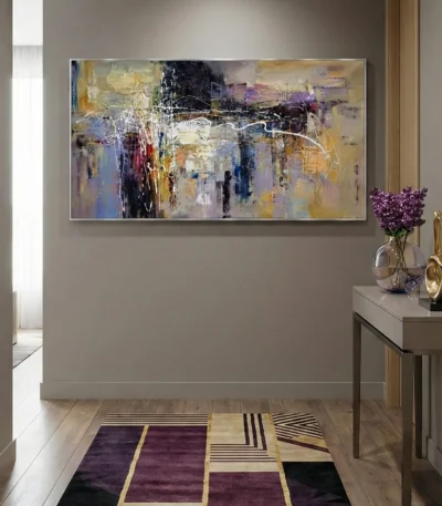 Layered abstract expressionist hand-painted canvas in muted purples, golds, and blacks with gestural white markings, contemporary entryway