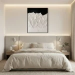 Textured monochrome hand-painted canvas depicting snow-capped mountain peaks in white and grey, contemporary bedroom