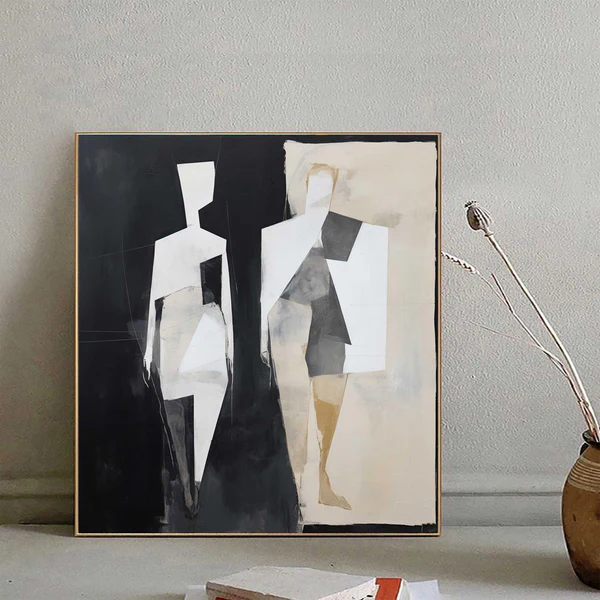 Contemporary abstract hand-painted canvas depicting fragmented human figures in monochrome black, white, and ochre tones, modern interior
