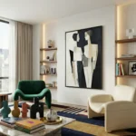 Contemporary abstract hand-painted canvas in black, cream, and taupe with gestural figure forms, modern living space