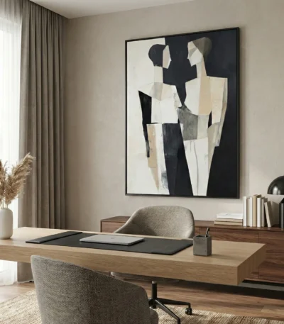 Abstract hand-painted canvas with layered geometric figures in black, cream, and taupe tones, contemporary office