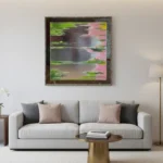 Contemporary abstract hand-painted canvas with layered greens, pinks, and yellows depicting reflective water landscape, modern living space