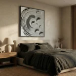 Gestural abstract hand-painted canvas in monochrome swirls and circular forms, charcoal and cream, modern bedroom