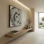 Gestural abstract hand-painted canvas with concentric circular brushstrokes in monochrome black and white, contemporary entryway