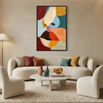 Abstract hand-painted canvas with geometric shapes in red, gold, teal, and cream tones, contemporary living space