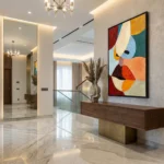 Abstract hand-painted canvas with bold geometric shapes in red, yellow, blue, and orange tones, contemporary entryway