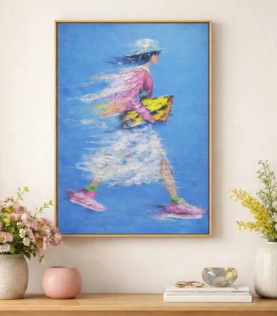 Contemporary figurative hand-painted canvas depicting a woman in motion with vibrant pink and yellow accents against brilliant blue, modern interior setting