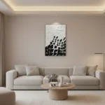 Monochrome abstract hand-painted canvas with geometric optical patterns in black and white, contemporary living space