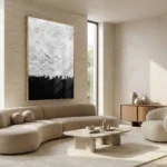 Textured abstract hand-painted canvas with circular patterns in white and black ink gestural strokes, contemporary living space