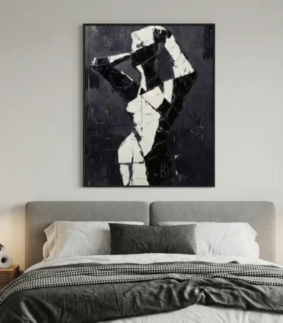 Abstract expressionist hand-painted canvas depicting gestural figure in stark black and white, modern bedroom