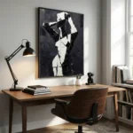 Abstract monochromatic hand-painted canvas with bold black and white gestural forms, contemporary study space