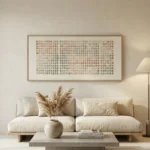 Minimalist abstract hand-painted canvas in layered taupe and cream tones with pixelated grid pattern, contemporary living space