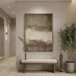 Abstract landscape hand-painted canvas in soft neutrals and muted earth tones, contemporary entryway