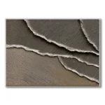 Plaster relief of layered torn-paper-like ridges in taupe and grey, cream thin frame
