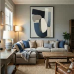 Minimalist abstract hand-painted canvas in navy, cream and grey organic shapes, contemporary living space
