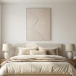 Textured abstract hand-painted canvas with flowing curved lines in cream and natural tones, contemporary bedroom