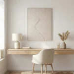 Textured minimalist hand-painted canvas with organic curved forms in cream and soft taupe tones, contemporary workspace