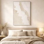 Textured abstract hand-painted canvas in cream and warm beige tones with gestural white brushstrokes, contemporary bedroom