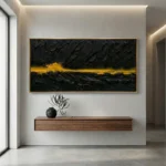 Textured abstract hand-painted canvas with dramatic black brushstrokes and golden horizon line, contemporary interior setting