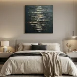 Textured abstract hand-painted canvas with layered metallic brushstrokes in deep teal and gold, modern bedroom