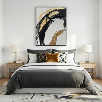 Abstract expressionist hand-painted canvas with bold black and gold gestural brushstrokes on cream, modern bedroom