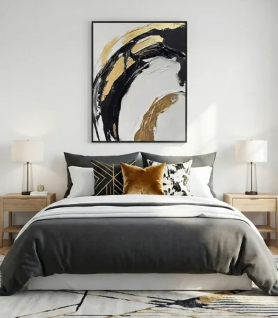 Abstract expressionist hand-painted canvas with bold black and gold gestural brushstrokes on cream, modern bedroom
